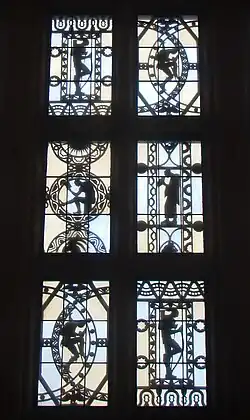 Metal silhouettes, designed by Rene Chambellan, on the banking hall's windows