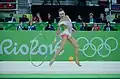 Rolling the hoop along the floor (Marina Durunda)