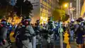 Riot police move to Ching Tak Street for dispersal.