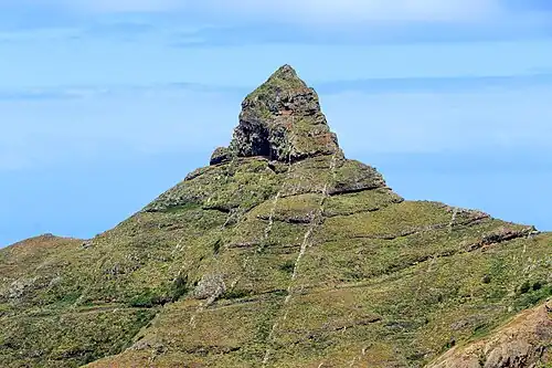 Basaltic lava flows and subordinate pyroclastic rock layers cut by vertical dykes at Roque de Taborno in the Anaga Massif on Tenerife[307][308]
