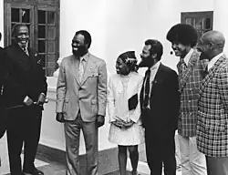 Roy Innis (2nd from left) and then wife Doris Funnye Innis (center) with a delegation from CORE is greeted by Kenyan President Jomo Kenyatta (left).