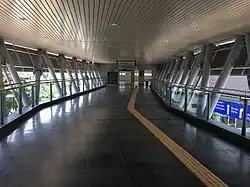 Pedestrian link heading towards 1Powerhouse from Entrance A of the station