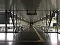 View of the pedestrian link bridge between the entrance A and the station