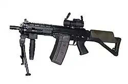 SG 552 Commando with an integral Picatinny rail and various accessories