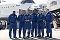 Commander Charles Hobaugh speaks on the tarmac