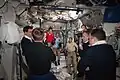 After the hatch opening, the ISS and STS-135 crews are united.