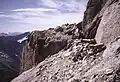 The large sandy ledges about halfway up, a good bivouac site
