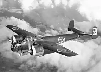 A Swedish Air Force S 18A flies with the F 11 Wing over Sweden, c. 1946