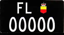 Genuine Liechtenstein vehicle registration plate with the invalid number 00000.
