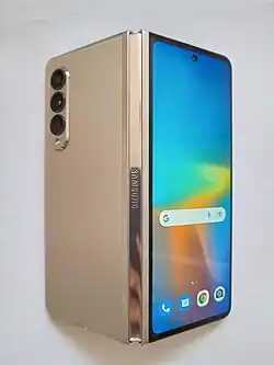 A Samsung foldable smartphone features multi-cameras.