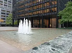 Looking toward the northeast within the building's plaza. There is a fountain at the left center.
