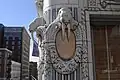 Terracotta detail, Arctic Building. The walrus's current tusks are plastic, as an earthquake safety precaution.