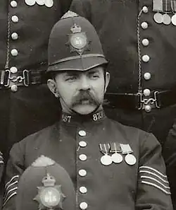 A black and white photo of Green in uniform
