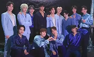 Seventeen in 2024 Top, L–R: Vernon, Jeonghan, S.Coups, Mingyu, Seungkwan, Hoshi, Woozi, The8, Joshua Bottom, L–R: Jun, Wonwoo, Dino, DK