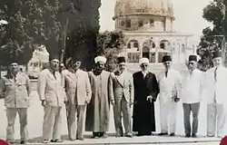 Delegation from the Arab Union hosted in Al-Aqsa by Sheikh Yousef T. al-Marwani (pictured in the center), member of the Supreme Muslim Council of Palestine (Jerusalem, March 12 1945)
