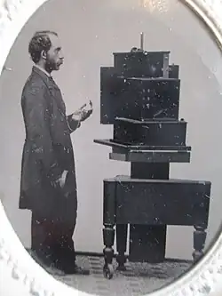 Photographer with a Simon Wing camera 1860