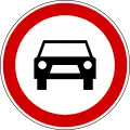 II-5 Road closed to all motor vehicles, except mopeds and motorcycles.