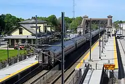 A southbound Northeast Regional train stopped at Kingston Station