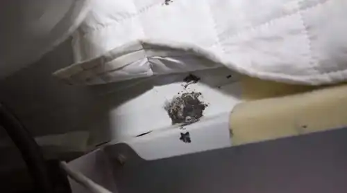 The hole patched with epoxy