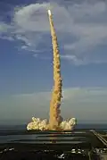Launch of Space Shuttle Atlantis viewed from the top of the Vehicle Assembly Building