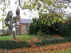 View of part of the church through foliage