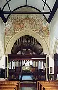 Chancel arch and painting of the twelve apostles