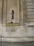 Statue on wall