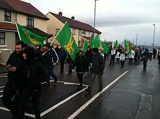 Members of the socialist political party Éirígí carry facsimile-Starry Plough flags in Derry, January 2013