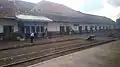 The Karawang station building seen from the Walahar Express train (2019)