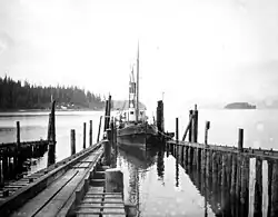 S.S. Kayak, a steamship, entering the slip at a cannery dock in Loring, July 1904
