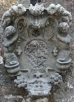 Coat of arms with Trissino insignia and the imperial eagle, located in the courtyard of the Teatro Olimpico.