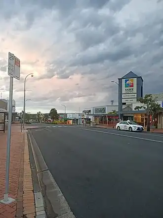 Street view of Taree central business district with Taree Central mall visible in the background