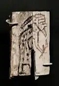 Vassal subject with headdress and spotted robe, possibly a Libyan, paying homage. First Dynasty, 2960–2770, Tomb of Menes B17, Abydos.[15][16]