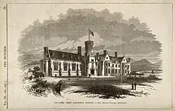 School building with a small number of figures stood outside
