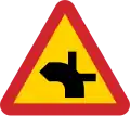 (thick is priority road) Road intersection where drivers of vehicles on connecting roads have a duty to give way.