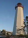 The Sylvan Lake Lighthouse with the waterslides in the background.