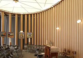 Interior view of a church with paper tube structural elements visible