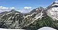 South aspect of Mount Taylor (left), Tszil Mountain (right of center), Slalok Mountain (upper right corner)