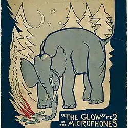 Elephant near a campfire in a forest