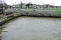 Footbridge and sluice.