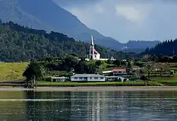 Ngai Tupoto Marae and the Church of Our Lady of the Assumption, Motukaraka Point, in the Kohukohu area, on the Hokianga Harbour