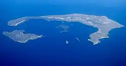 Three islands surrounding a sunken volcano in the Aegean Sea