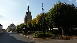 The church and surroundings in Thiville
