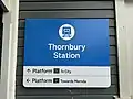The new style station entrance signage with new fonts and appearance, July 2024