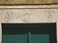Symbols on top of the entrance