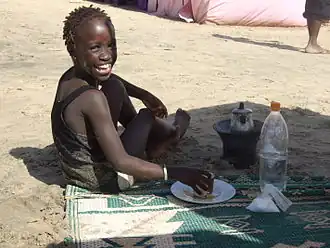 Gambian child making attaya