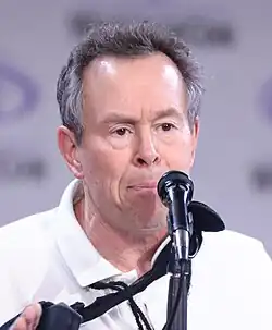 A photograph of Tom Ruegger