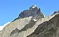 Light-colored granite and dark metamorphic rock of the Cuernos del Paine