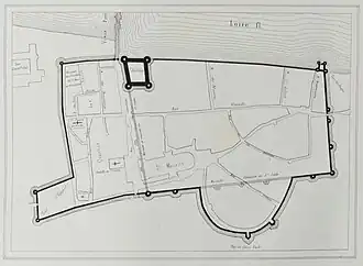 Black-and-white plan of an ancient city wall.