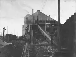 Rope-hauled inclined tramway to furnaces (1912). There were two such inclines, as there was a charging floor on both sides of the furnaces.